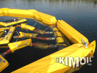 Floating Weir skimmer dewatering an ash pond